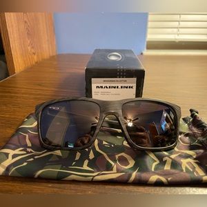 Oakley Mainlink - Woodgrain w/Prizm Daily Polar + EXTRA lenses